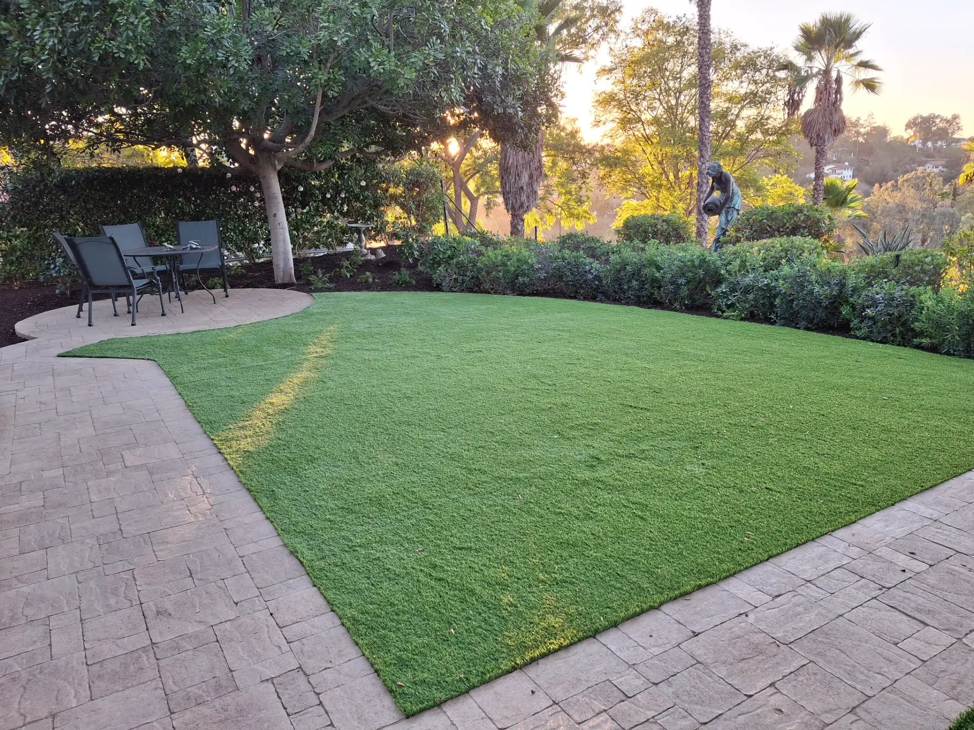 Eco-friendly permeable paver installation utilizing open-graded sub-base aggregates for 2026 stormwater management compliance and rapid groundwater recharge.